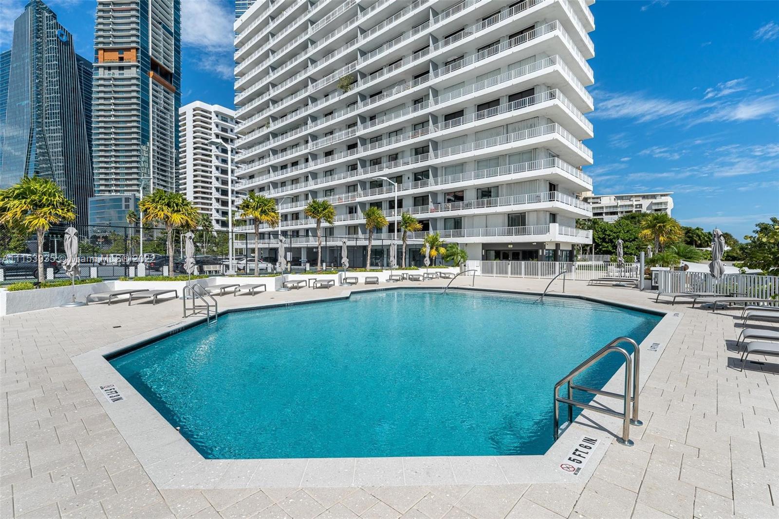 200 Southeast 15th Road, Unit 11H Miami, FL 33129 - Photo 4 of 20 a view of a swimming pool and outdoor space
