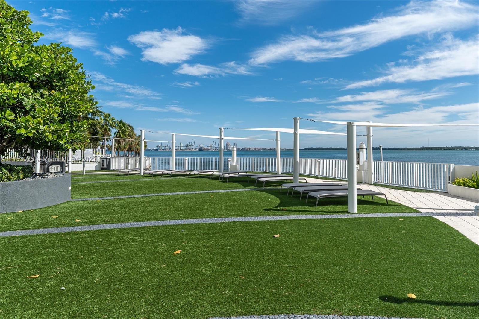 200 Southeast 15th Road, Unit 11H Miami, FL 33129 - Photo 7 of 20 a view of a house with a big yard