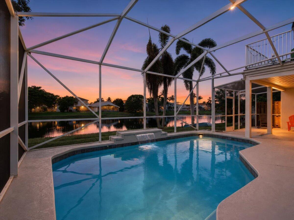 7386 Michigan Isle Road Lake Worth, FL 33467 - Photo 35 of 59 01-Twilight Backyard