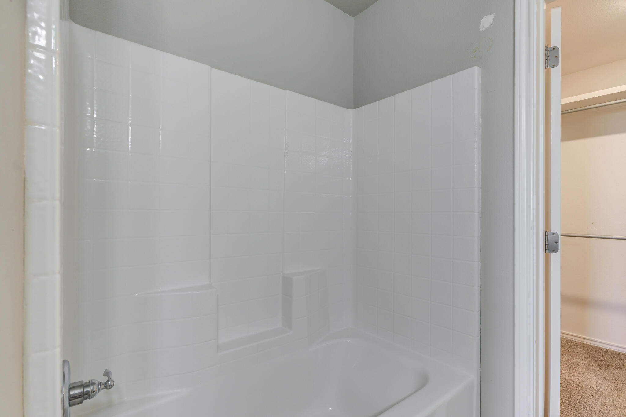 6906 67th Street Lubbock, TX 79424 - Photo 23 of 35 a close up of a bathtub