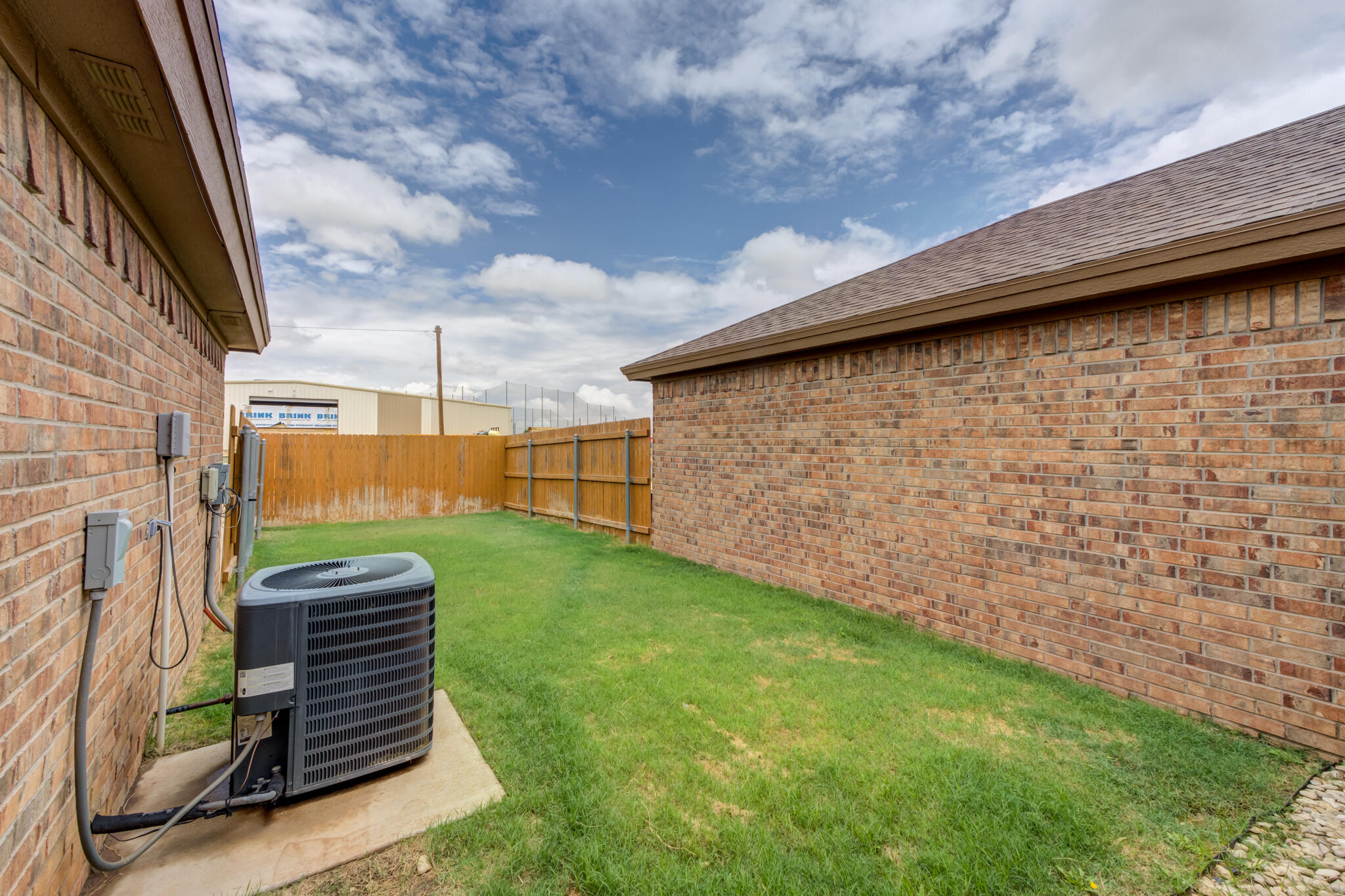 6906 67th Street Lubbock, TX 79424 - Photo 35 of 35 a view of a backyard with sitting area