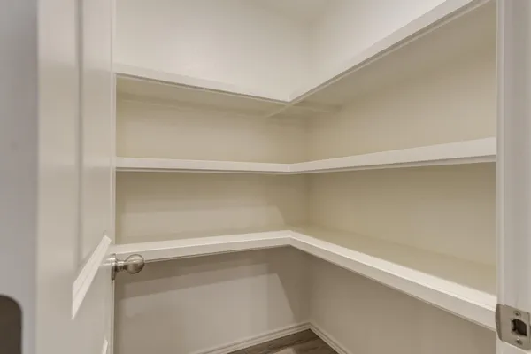 a view of an empty walk in closet