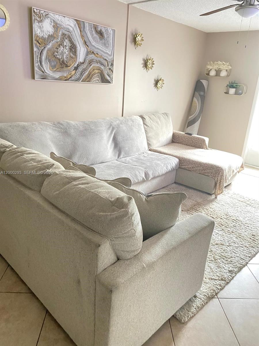 2701 Riverside Drive, Unit 316B Coral Springs, FL 33065 - Photo 3 of 7 a living room with furniture