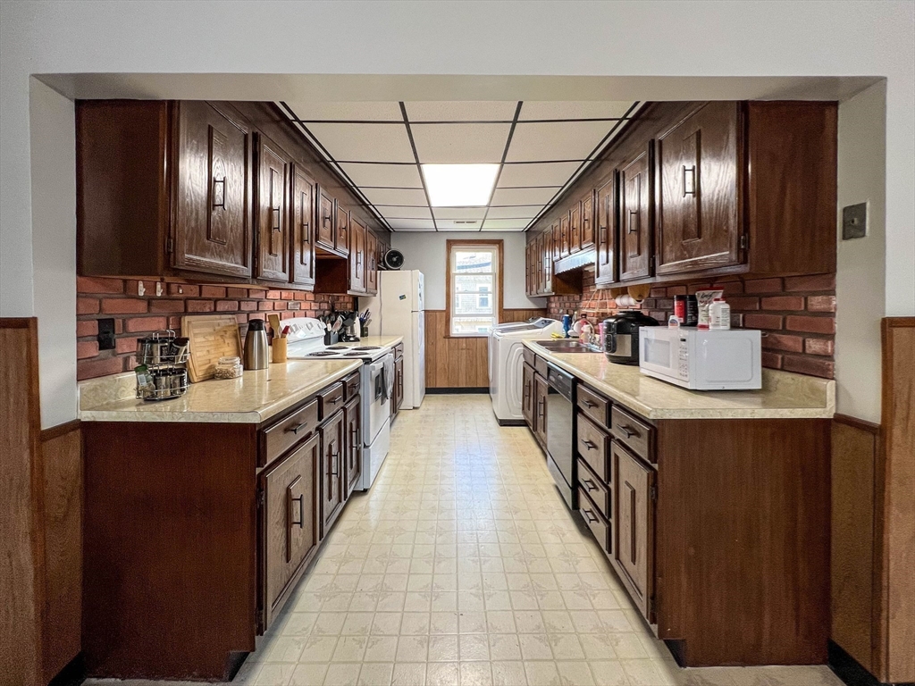 57 Vale Street Worcester, MA 01604 - Photo 17 of 42 a kitchen with lots of counter top space