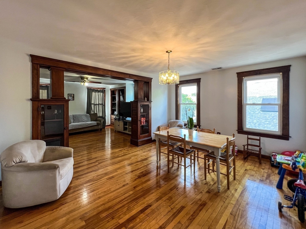 57 Vale Street Worcester, MA 01604 - Photo 22 of 42 a living room with furniture and wooden floor