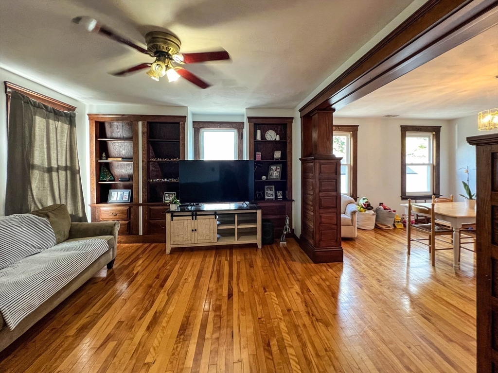 57 Vale Street Worcester, MA 01604 - Photo 23 of 42 a living room with furniture and a flat screen tv