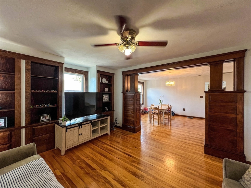 57 Vale Street Worcester, MA 01604 - Photo 24 of 42 a living room with furniture and a flat screen tv