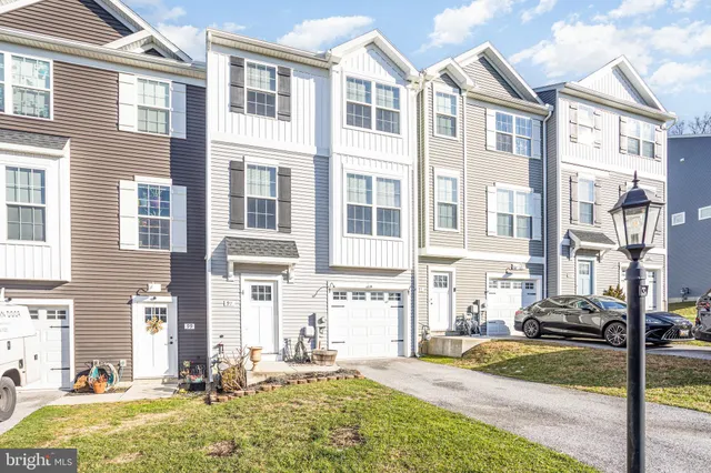 a front view of a building with street view