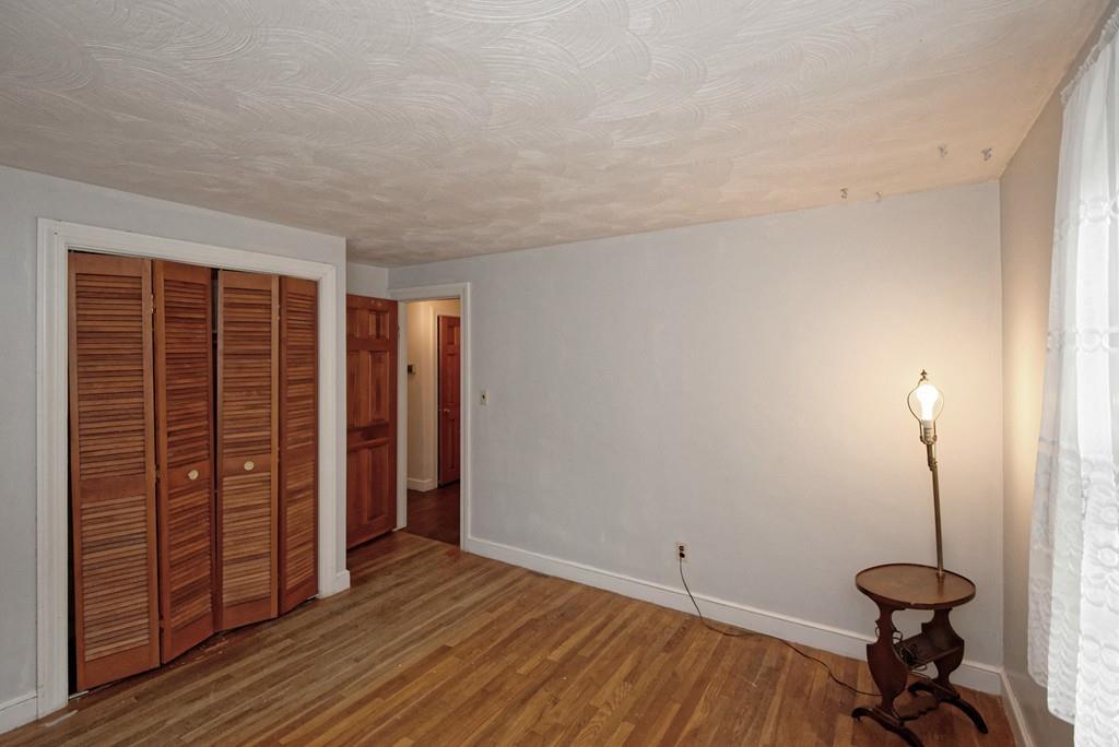 10 Eaton Road Framingham, MA 01701 - Photo 19 of 39 a view of empty room with wooden floor