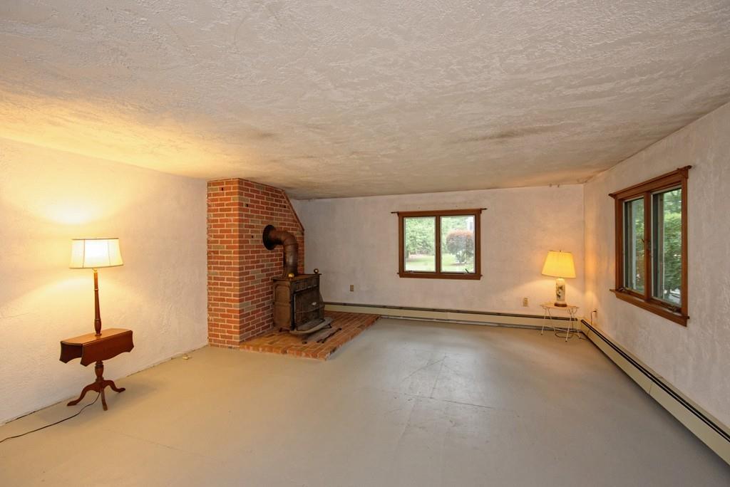 10 Eaton Road Framingham, MA 01701 - Photo 2 of 39 a view of a livingroom with furniture and a window