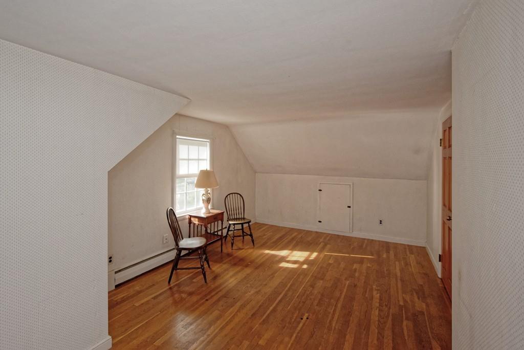 10 Eaton Road Framingham, MA 01701 - Photo 27 of 39 a view of a livingroom with chairs and wooden floor