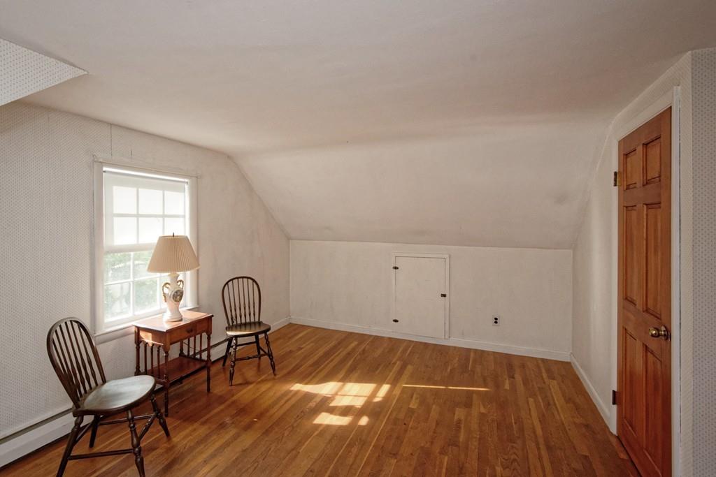 10 Eaton Road Framingham, MA 01701 - Photo 29 of 39 a workspace with wooden floor and a window