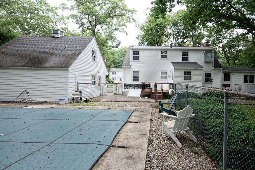 10 Eaton Road Framingham, MA 01701 - Photo 34 of 39 a view of a house with backyard and sitting area