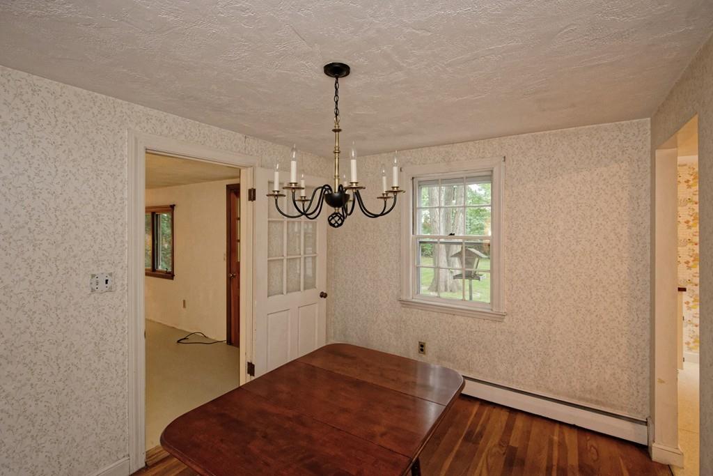 10 Eaton Road Framingham, MA 01701 - Photo 6 of 39 a bedroom with a bed and a window