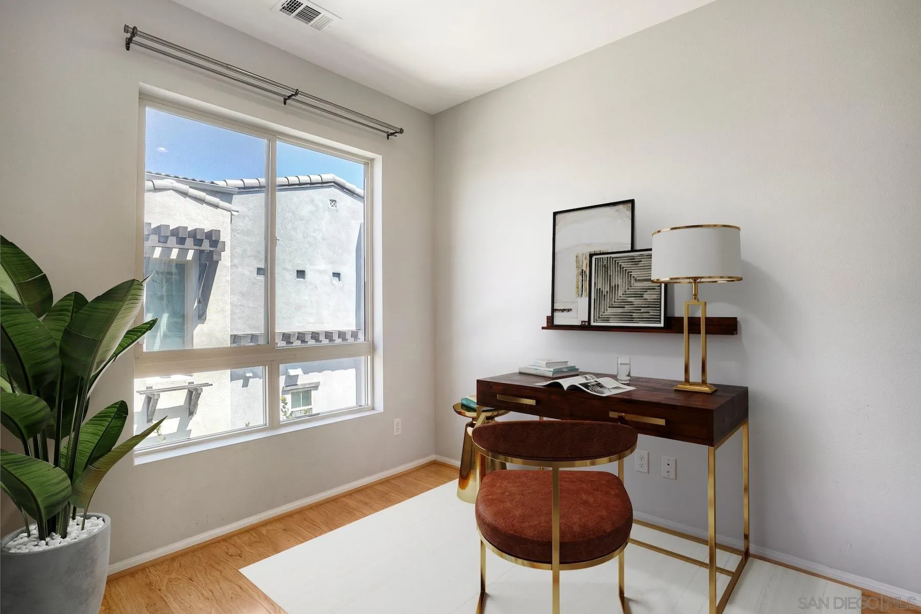8850 Olive Lane, Unit 7 Santee, CA 92071 - Photo 20 of 27 a view of a workspace with furniture and a window