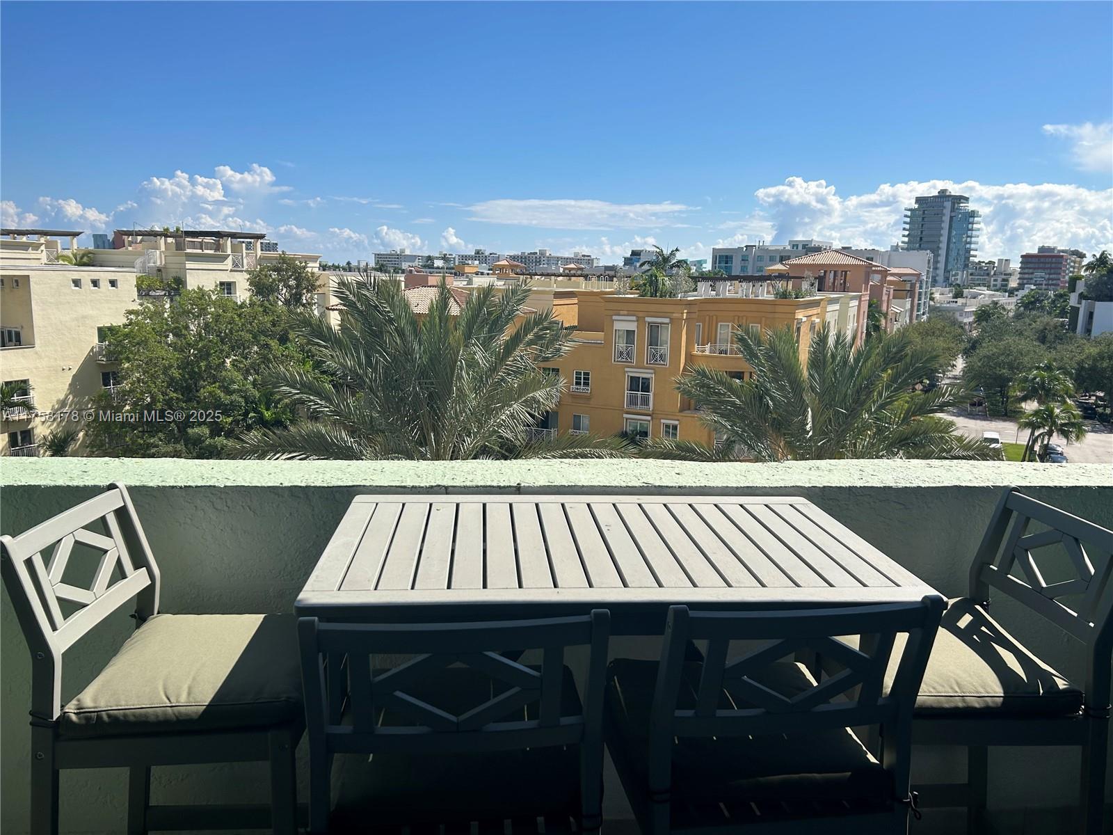 90 Alton Road, Unit 607 Miami Beach, FL 33139 - Photo 12 of 14 a view of a patio in terrace