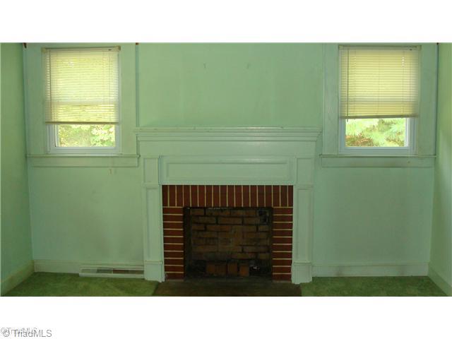 3196 Westfield Road Mount Airy, NC 27030 - Photo 9 of 10 Living Room. Living Room with Fireplace (Hardwoods Under the Carpet)