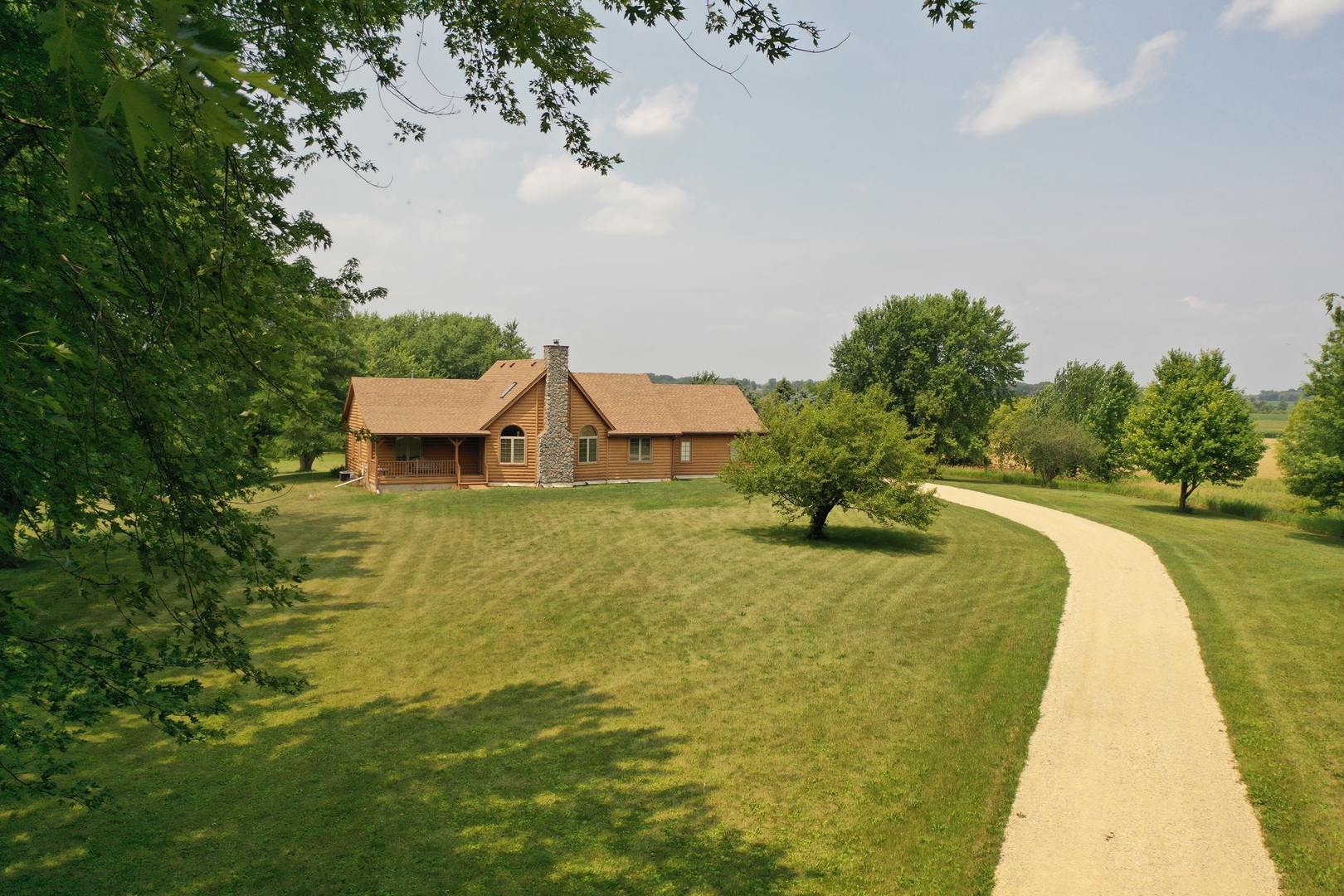 23504 Flat Iron Road Harvard, IL 60033 - Photo 2 of 27 a swimming pool with yard