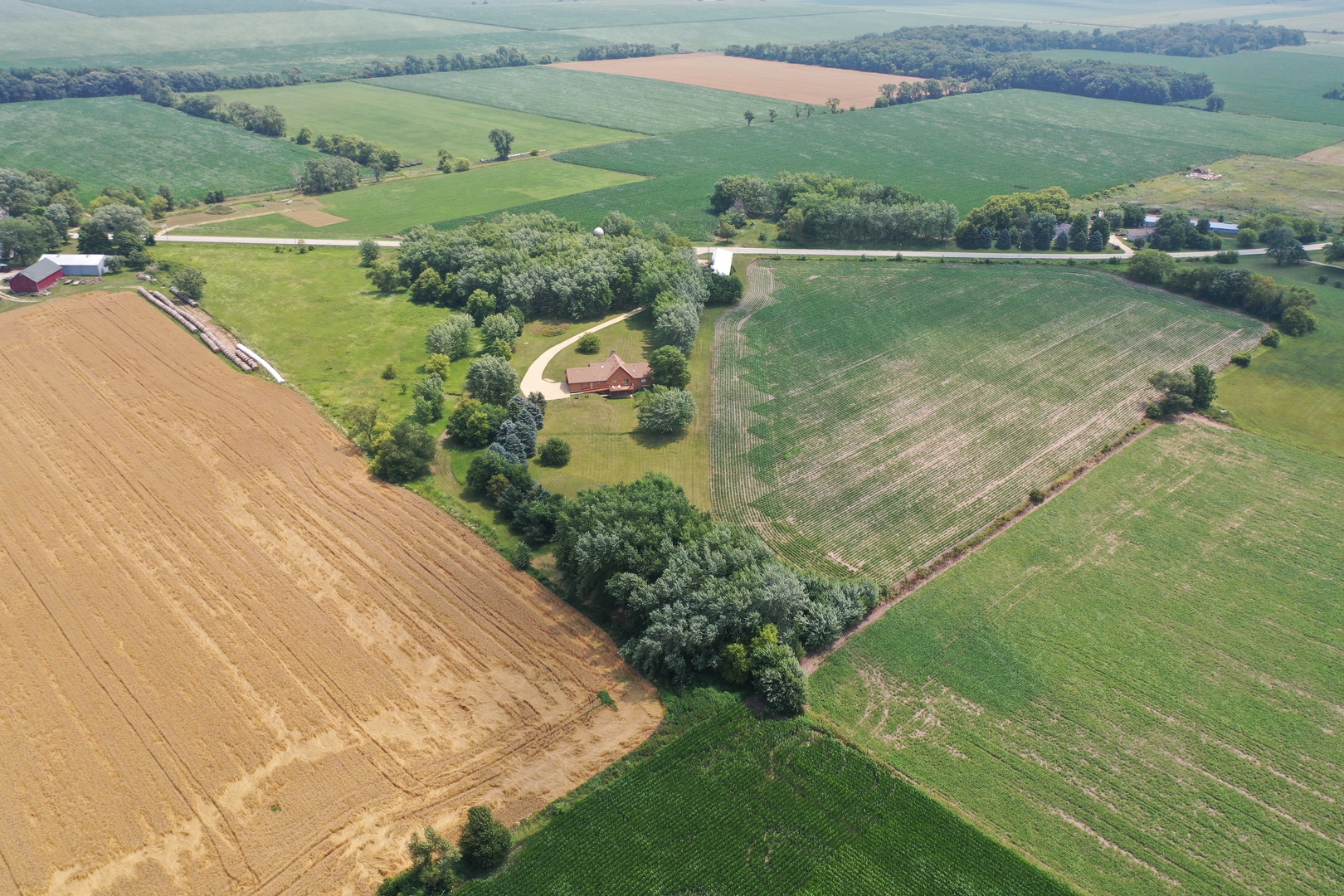 23504 Flat Iron Road Harvard, IL 60033 - Photo 23 of 27 an aerial view of a houses with outdoor space and a lake view