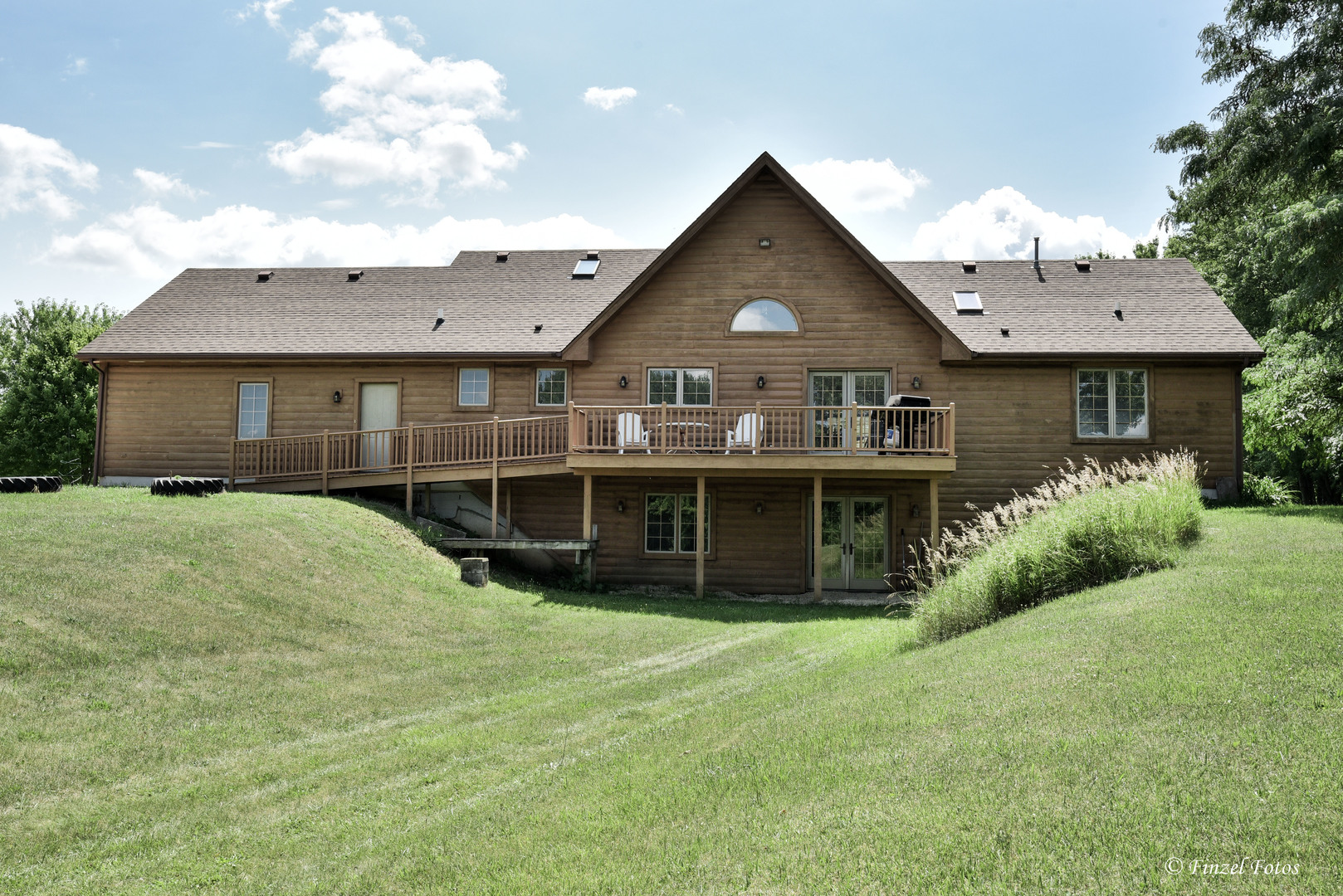 23504 Flat Iron Road Harvard, IL 60033 - Photo 27 of 27 a front view of a house with a garden