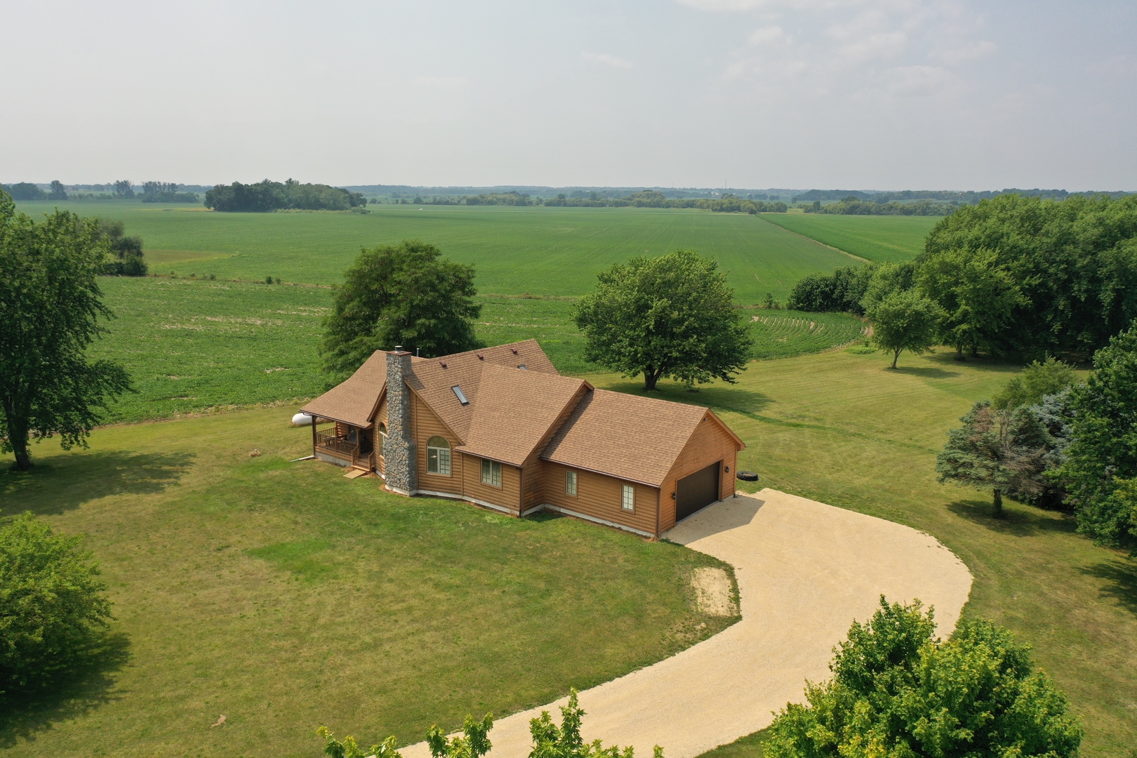 23504 Flat Iron Road Harvard, IL 60033 - Photo 3 of 27 a view of a terrace with yard and mountain view in back