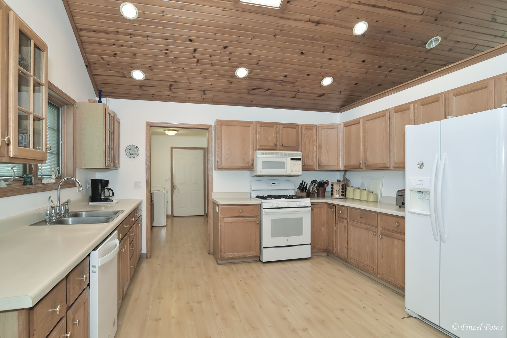 23504 Flat Iron Road Harvard, IL 60033 - Photo 10 of 27 a kitchen with stainless steel appliances granite countertop a sink stove and refrigerator