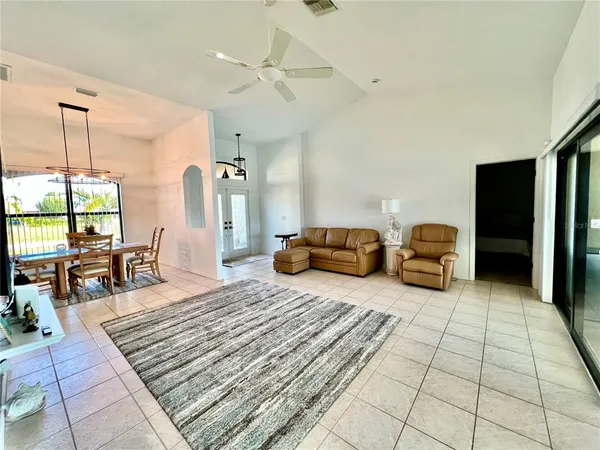 a living room with furniture and a couch