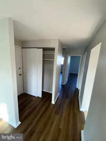 a view of entryway with wooden floor