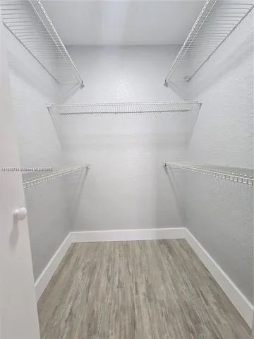 a view of a room with racks on the wall