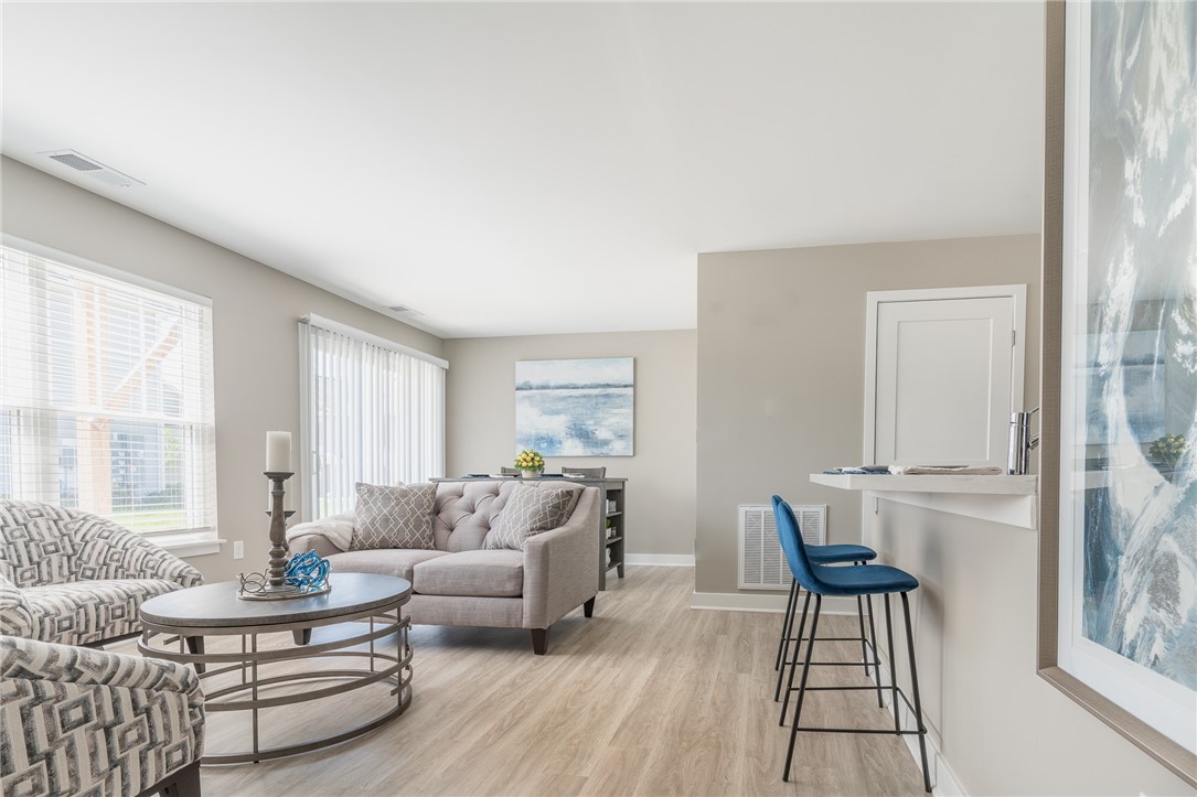 603 Erie Ridge Drive Henrietta, NY 14467 - Photo 2 of 5 Interior view of similar great room including livi