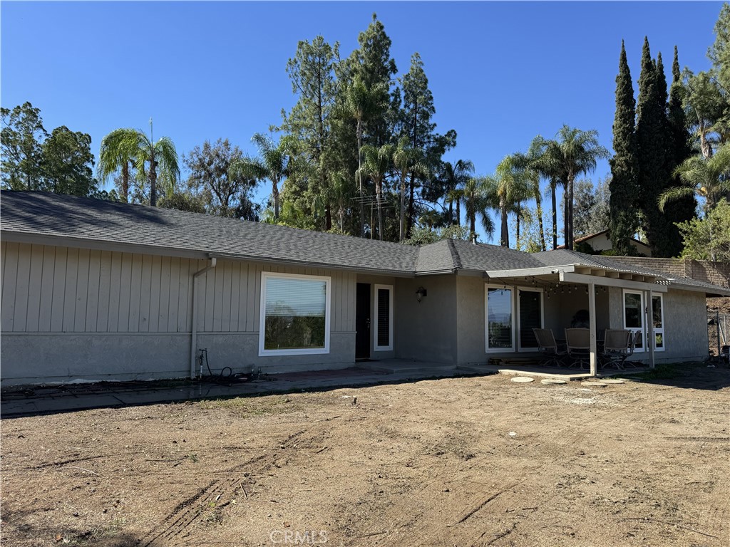 15521 Saddleback Road Woodcrest, CA 92506 - Photo 1 of 24 a view of a house with a yard
