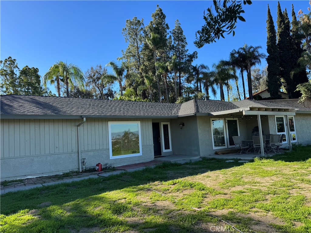 15521 Saddleback Road Woodcrest, CA 92506 - Photo 2 of 24 a front view of a house with a yard