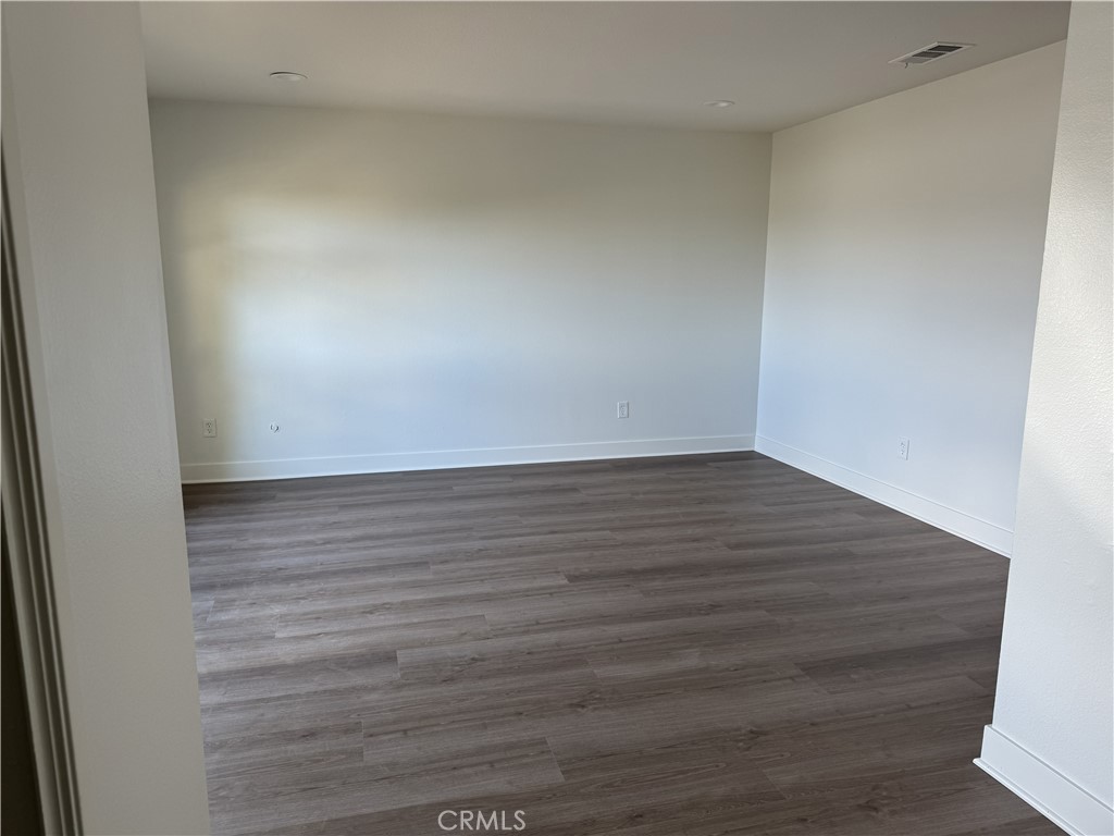 15521 Saddleback Road Woodcrest, CA 92506 - Photo 24 of 24 a view of wooden floor and brick walls