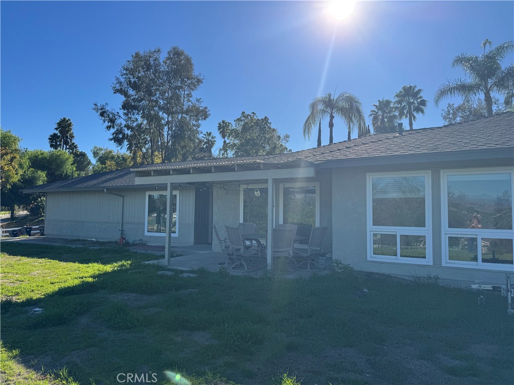 15521 Saddleback Road Woodcrest, CA 92506 - Photo 3 of 24 a view of a house with a yard