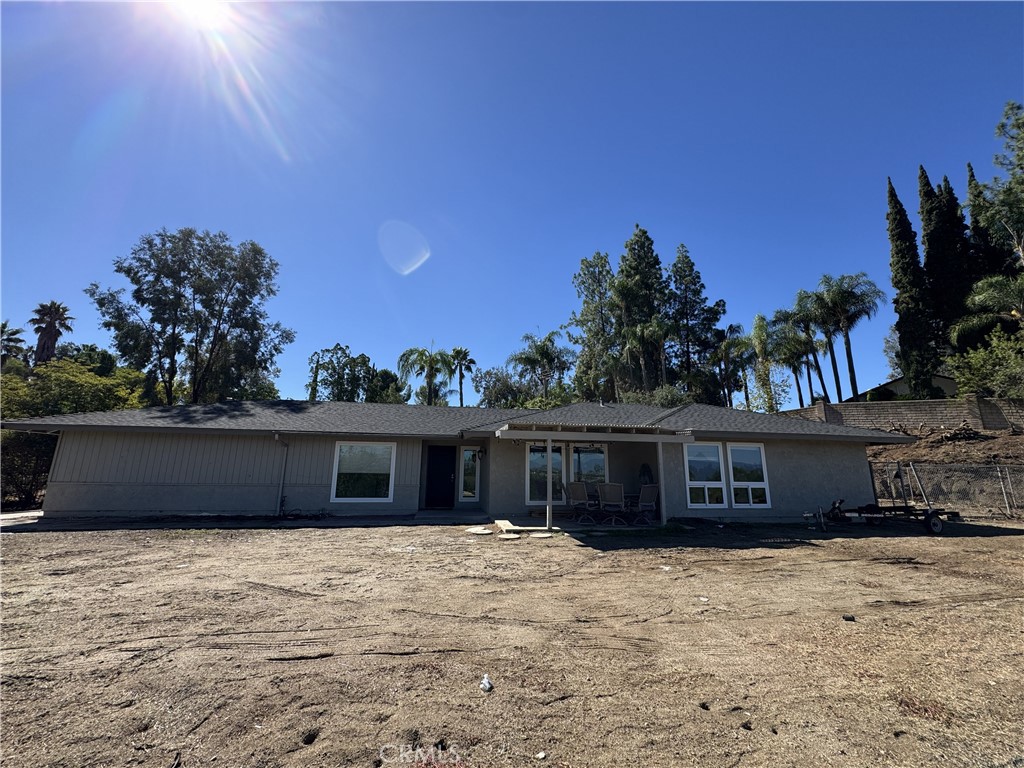 15521 Saddleback Road Woodcrest, CA 92506 - Photo 4 of 24 a front view of a house with a yard
