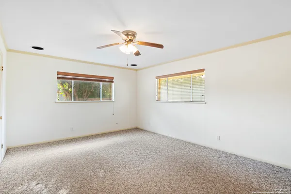 a view of an empty walk in closet