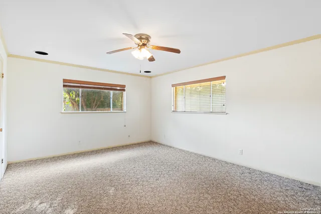 a view of an empty walk in closet