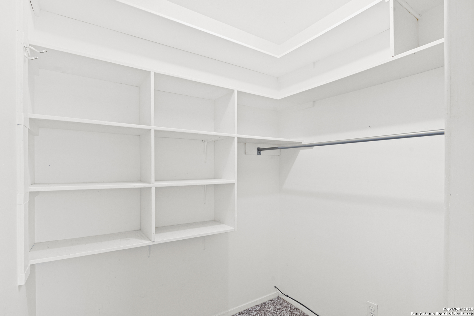 715 Studer Street Uvalde, TX 78801 - Photo 18 of 44 a view of an empty walk in closet