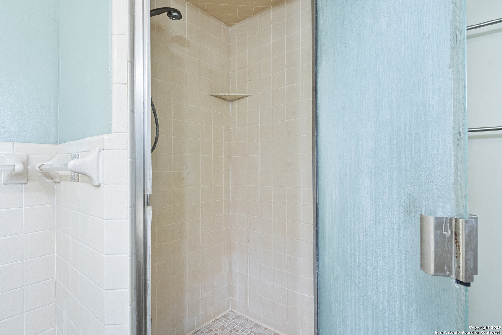 715 Studer Street Uvalde, TX 78801 - Photo 21 of 44 a bathroom with a shower