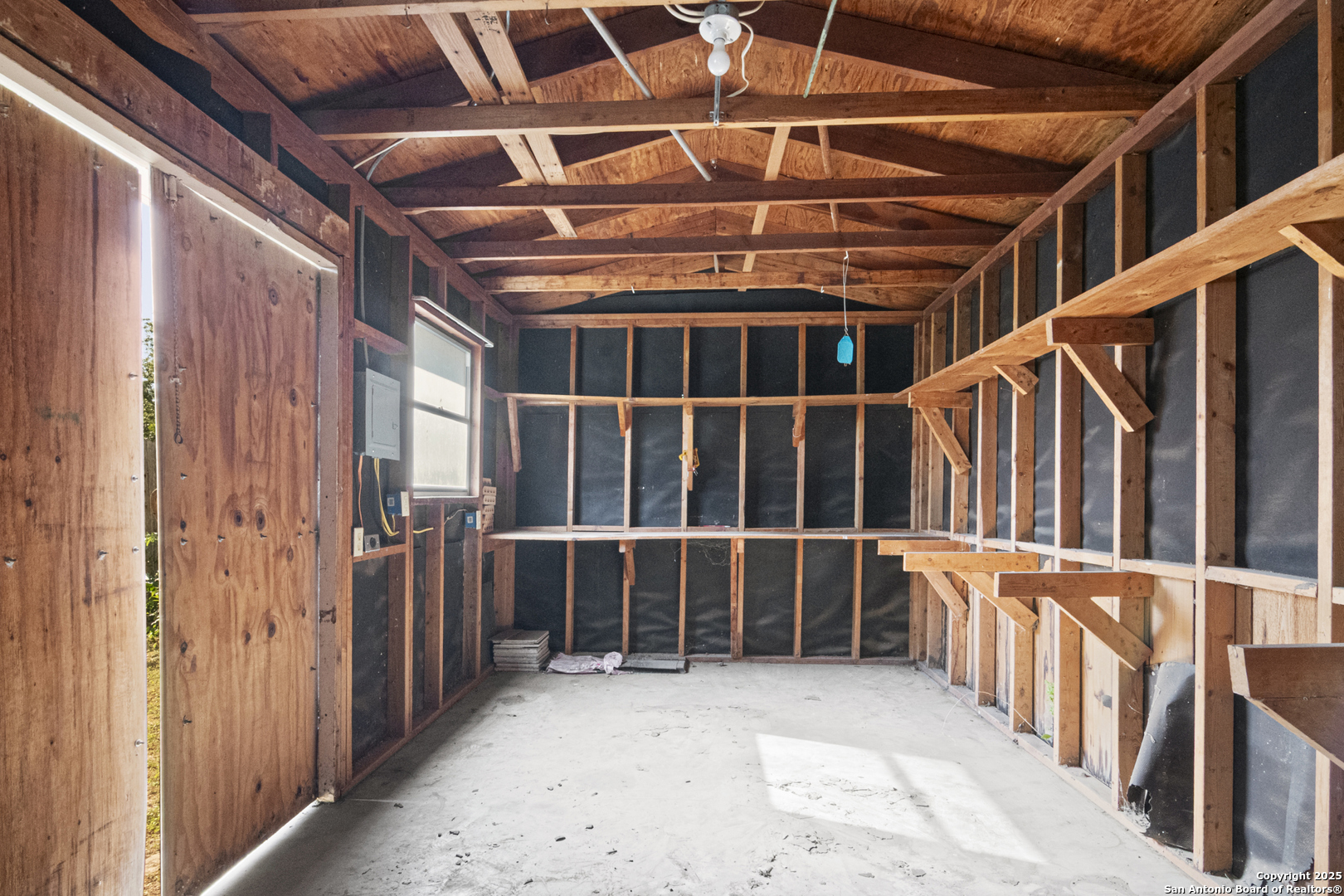 715 Studer Street Uvalde, TX 78801 - Photo 37 of 44 a view of an empty room with wooden fence