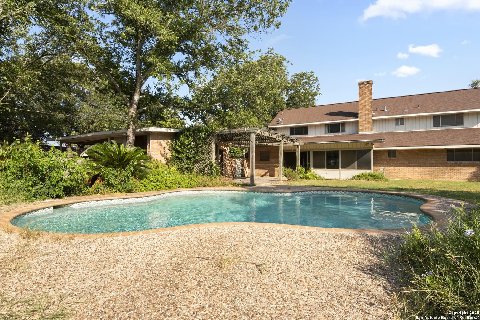 715 Studer Street Uvalde, TX 78801 - Photo 38 of 44 a front view of a house with a yard