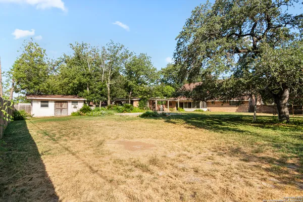 a view of a house with a big yard