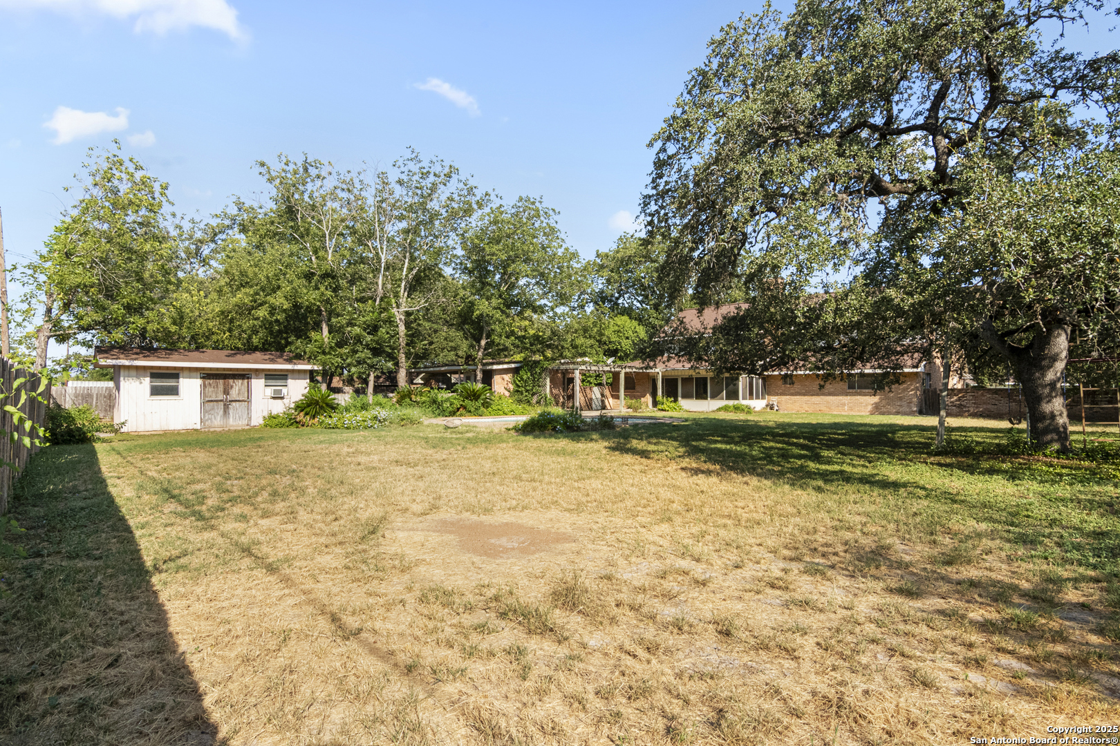 715 Studer Street Uvalde, TX 78801 - Photo 39 of 44 a front view of a house with a yard