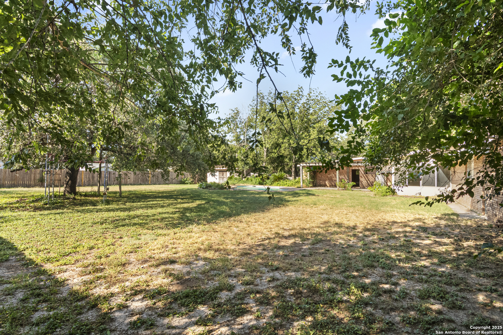 715 Studer Street Uvalde, TX 78801 - Photo 40 of 44 a view of a house with a big yard