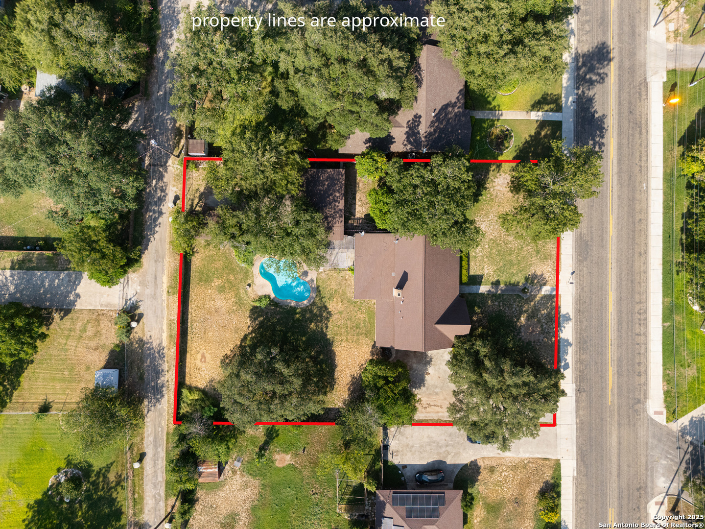 715 Studer Street Uvalde, TX 78801 - Photo 44 of 44 an aerial view of house with swimming pool