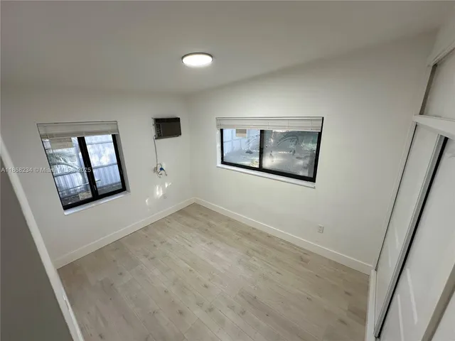 a bathroom with a toilet sink and a shower