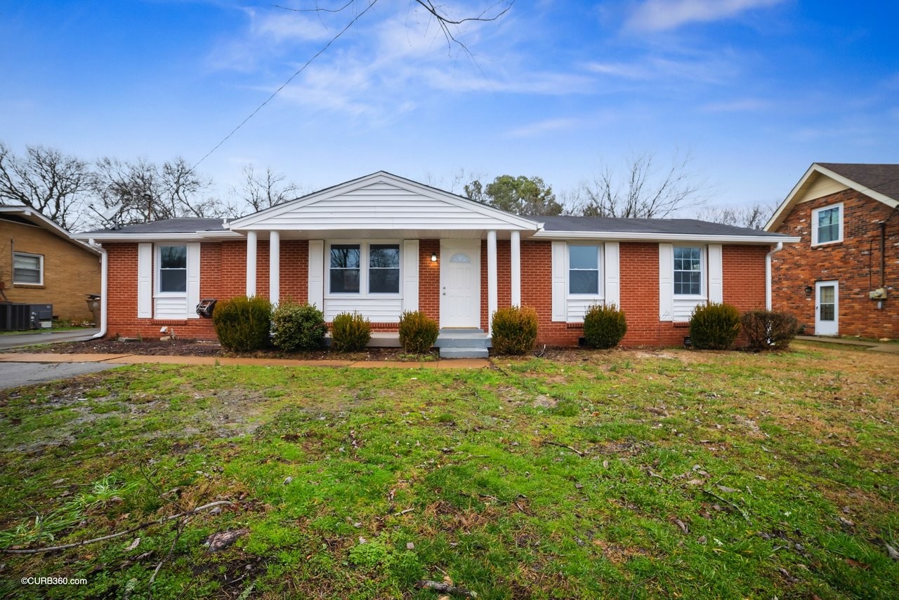 491 Rural Hill Road Nashville, TN 37217 - Photo 1 of 32 a front view of house with yard and green space