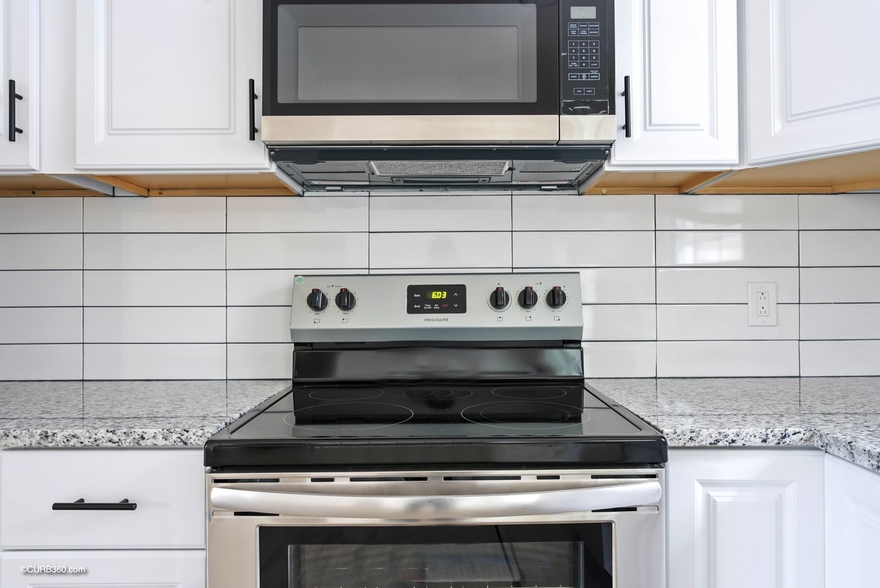 491 Rural Hill Road Nashville, TN 37217 - Photo 7 of 32 a stove top oven sitting inside of a kitchen