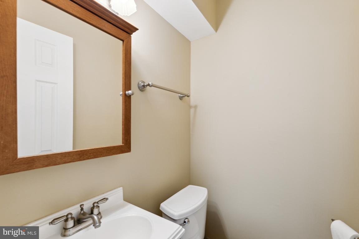 7448 Pohick Road Lorton, VA 22079 - Photo 12 of 25 Half bath in foyer