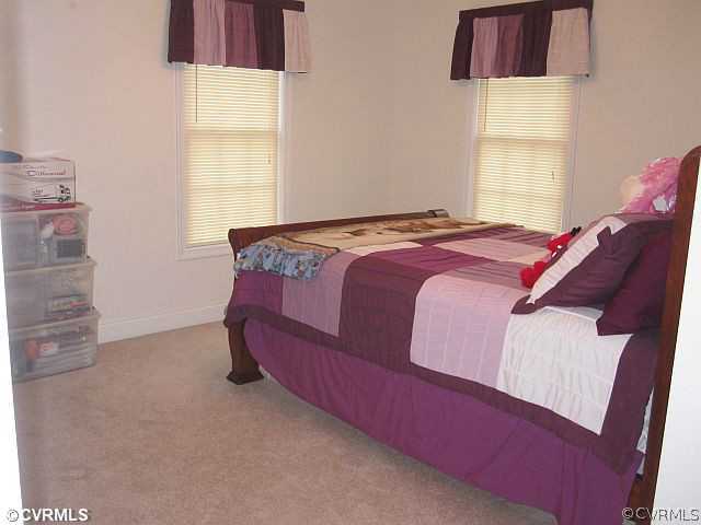 535 Levi Road Green Bay, VA 23942 - Photo 14 of 19 a bedroom with a bed and window